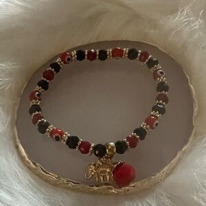 Evil Eye Bracelet with Red & Black Beads and Gold Elephant Charm
